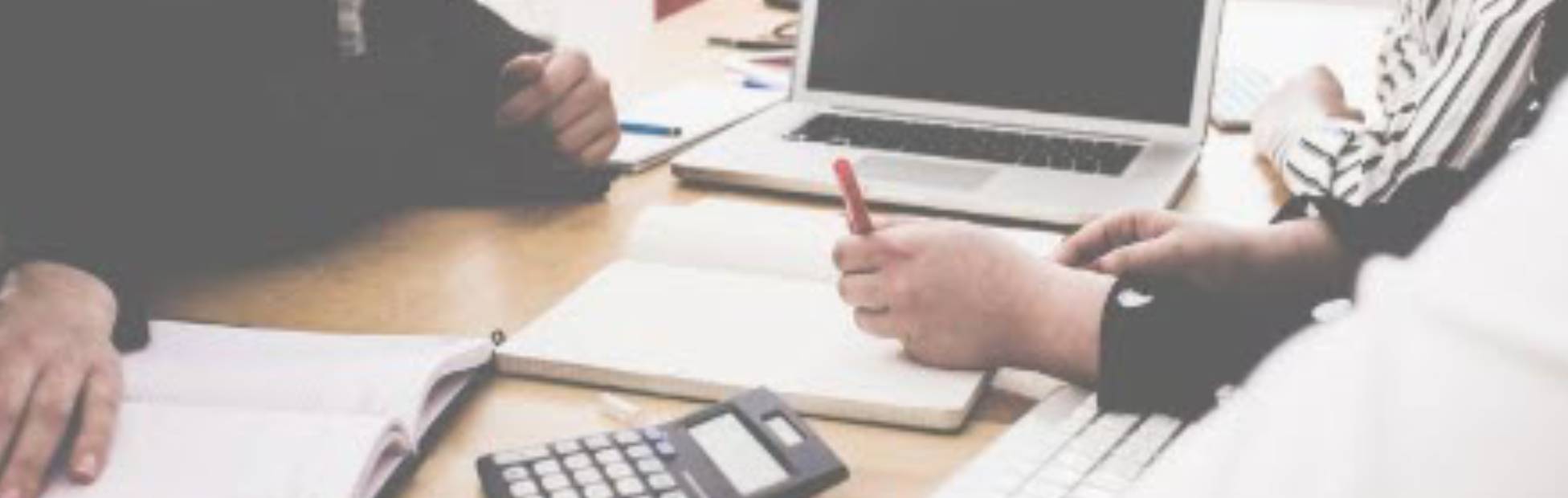 Lady leading a meeting with coworkers